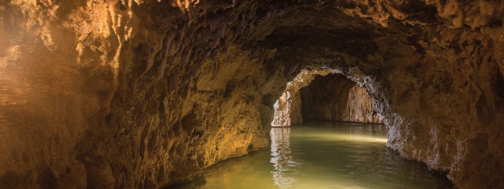 cave tunnel in water at Ainsworth Hot Springs in British Columbia, Canada