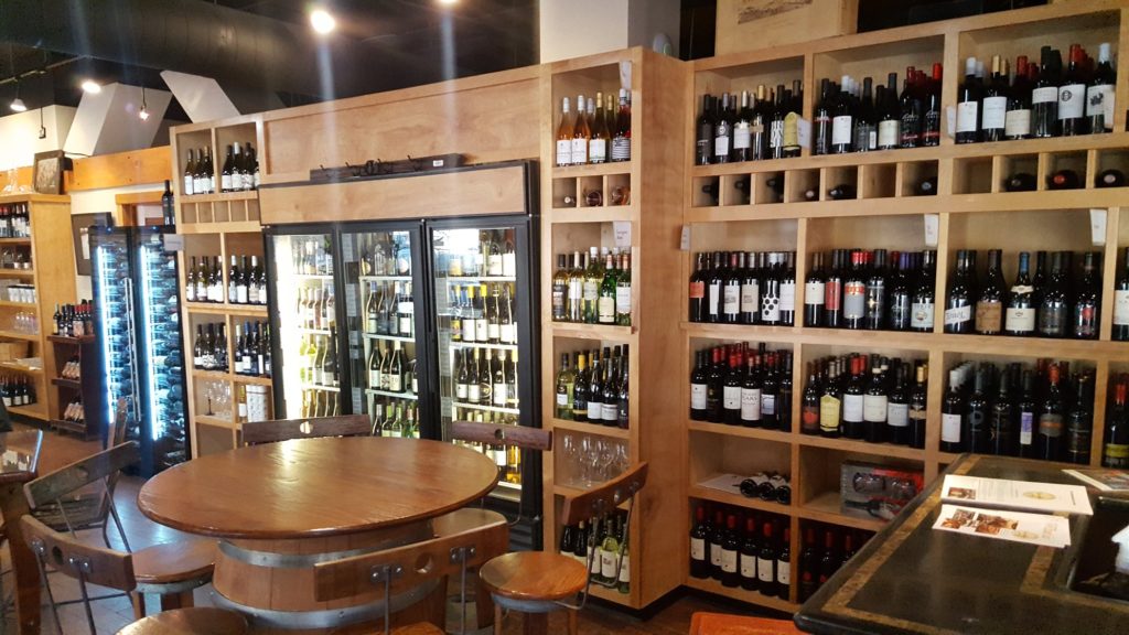 vast wine selection wine cooler at Gourmandie gourmet food and wine shop Schweitzer Mountain