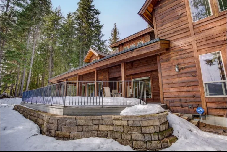 wood building with outdoor patio at the Nicklaus House your best choice for a vacation rental home in Priest Lake, Idaho