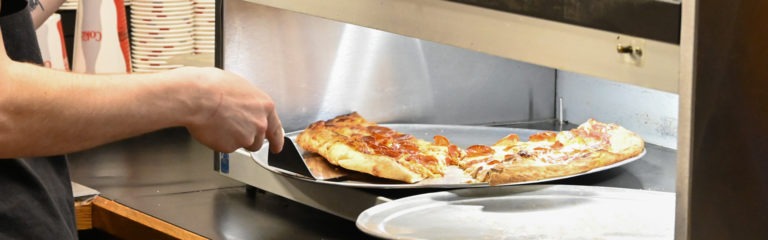 Fresh slices of hot pepperoni pizza served at Sam's Alley on Schweitzer Mountain