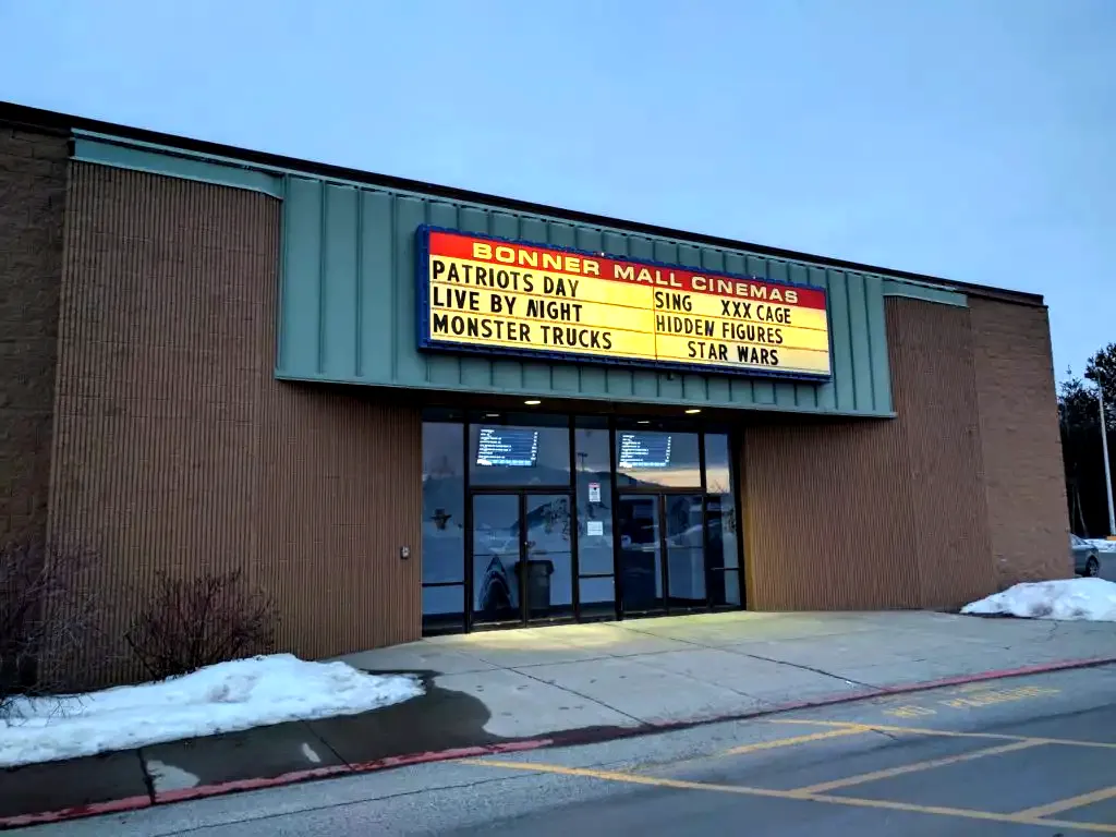 Sandpoint Cinemas at the Bonner Mall six movie theaters showing new films sign in front with movie showtimes